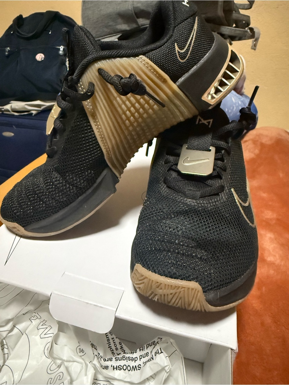 Nike Black and Gold Mesh Training Sneakers